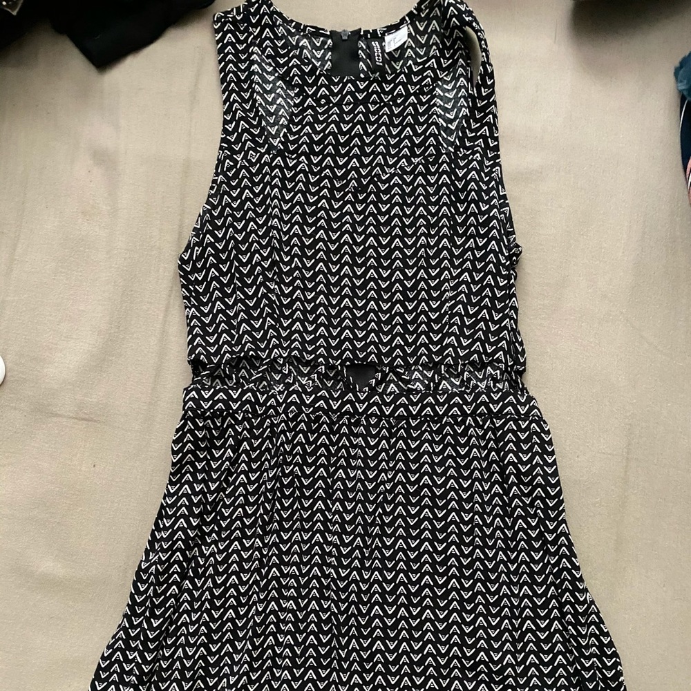 Cute mini dinner dress with cutouts